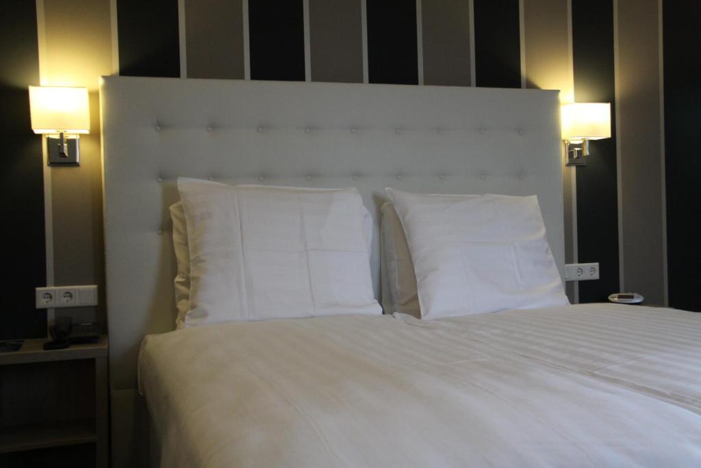Fletcher Hotel-Restaurant Duinzicht Ouddorp Rum bild